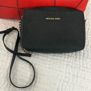 Michael Kors black crossbody handbag with gold details!